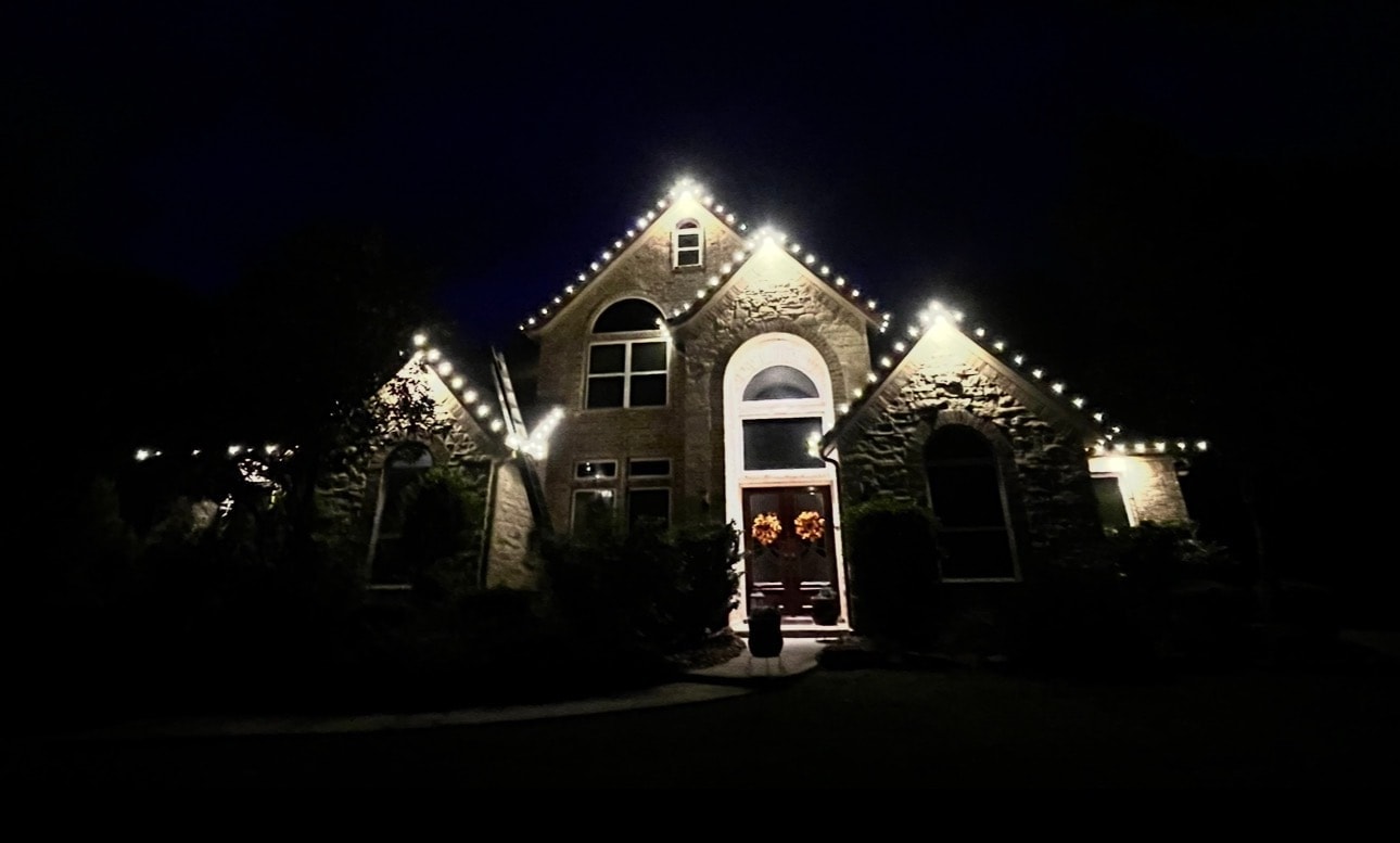 Warm white stone home — New Caney